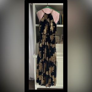 Formal gown. Navy with gold print. Gold metal neckline, adjustable clasp